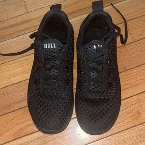 NOBULL black sneakers.